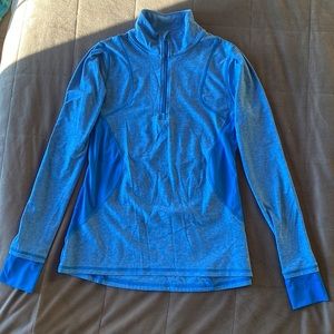 Champion women’s vibrant blue athletic 3/4 zip jacket. Material is breathable.